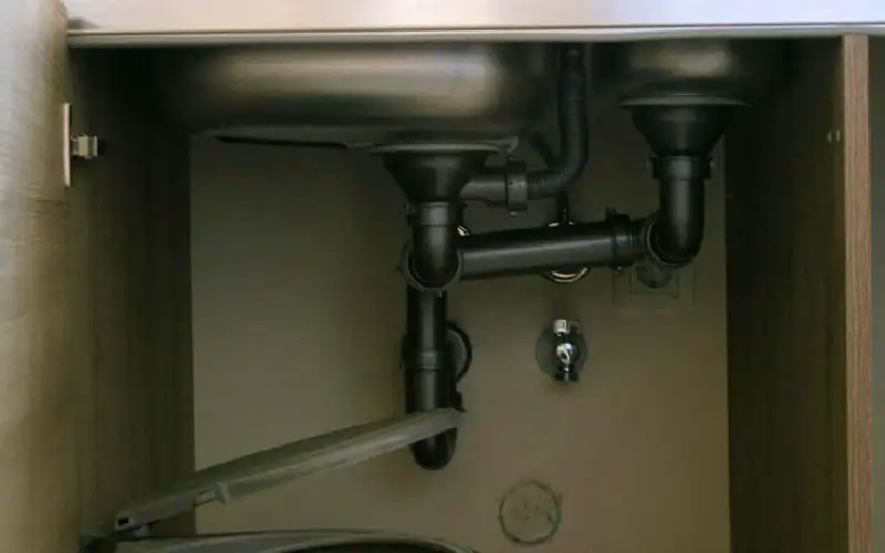 Drain pipes underneath a sink
