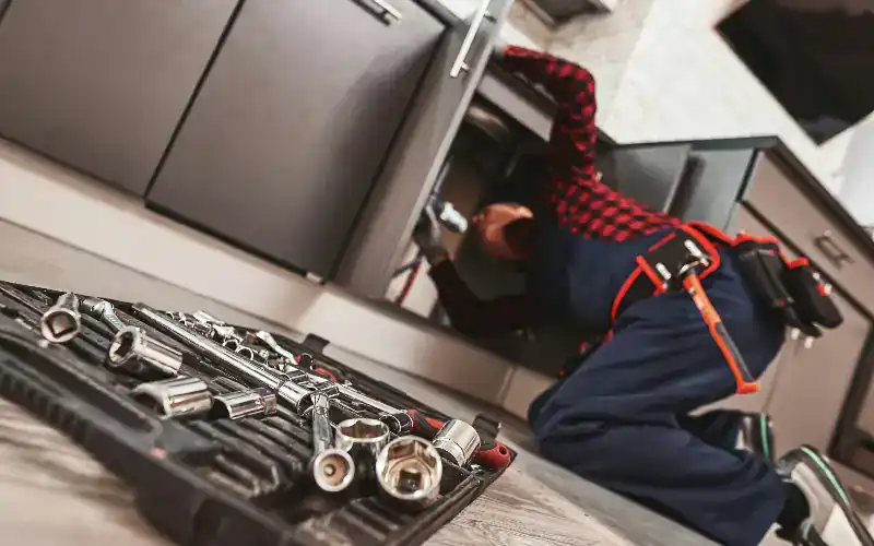 plumber and his toolbox